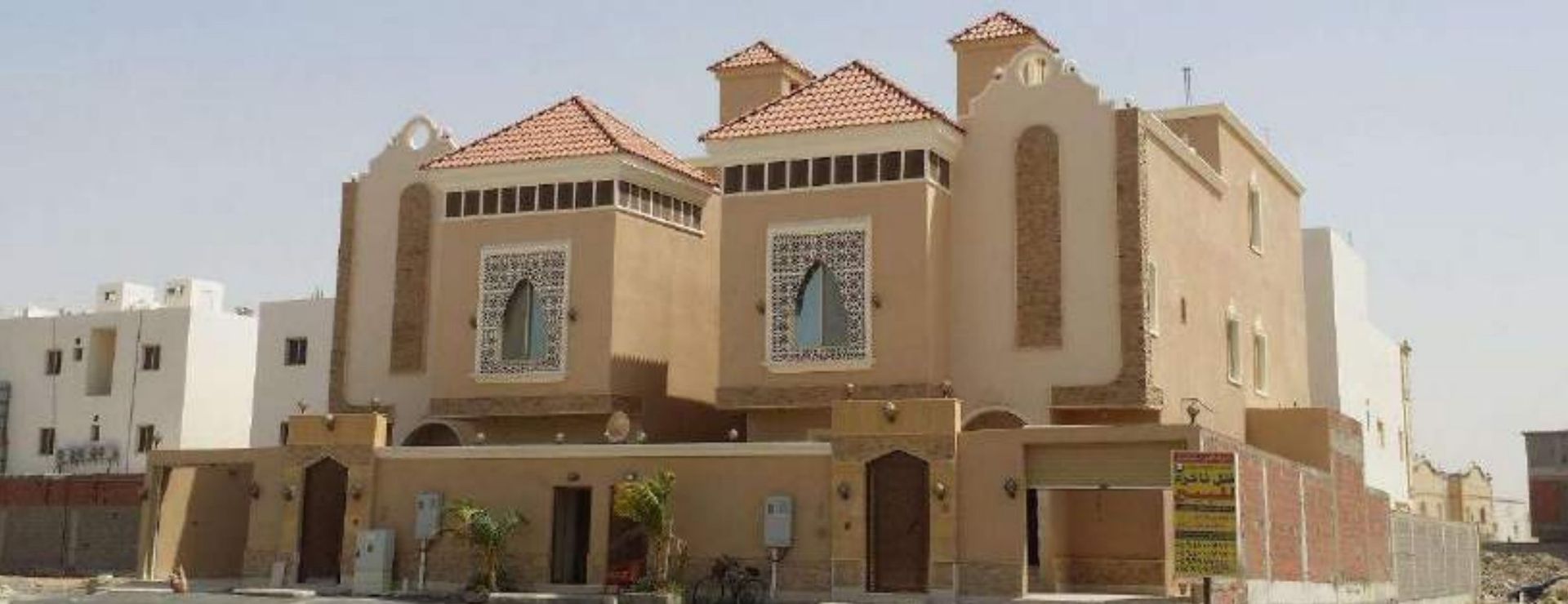Duplex villas with Islamic ornamentation identity